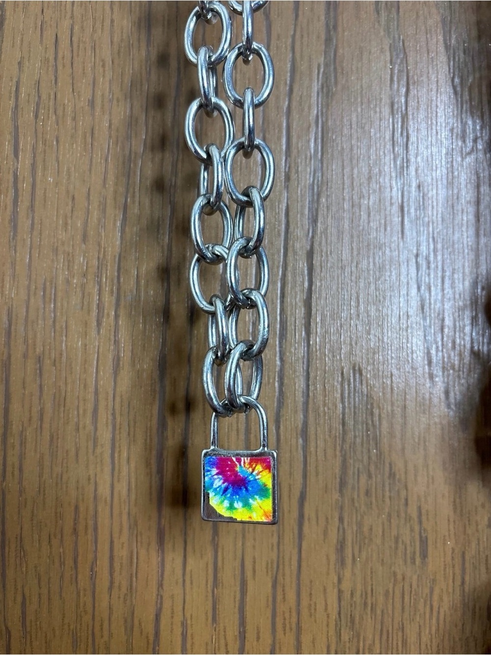 Tie-dye padlock pendant on thick necklace chain with lobster claw clasp